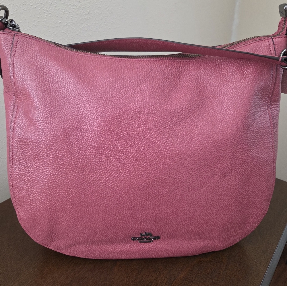 Coach Pink Leather Hobo Handbag With Twotone Strap And Oxidized Hardware.